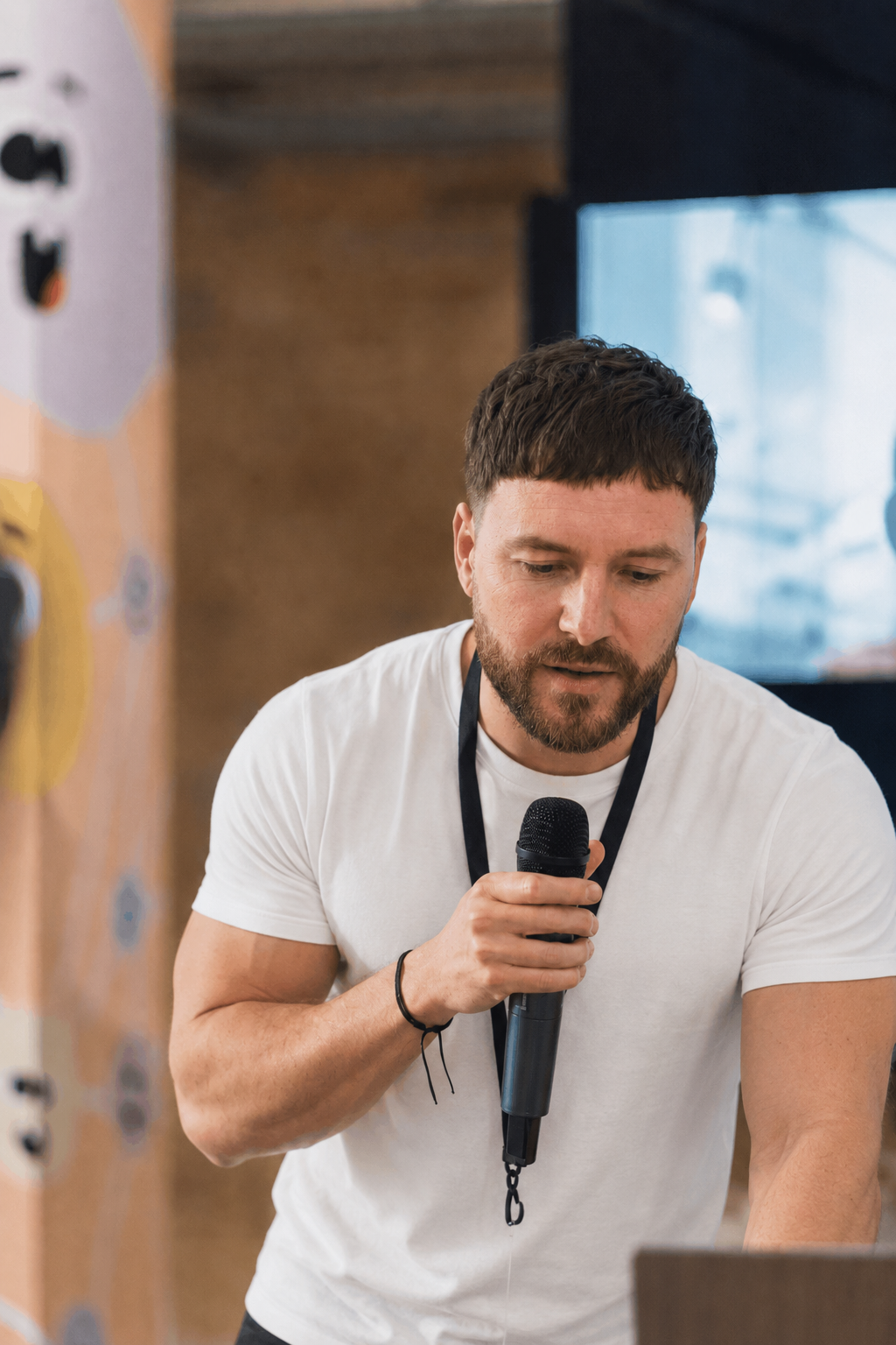 Alex Dickinson speaking at an industry event